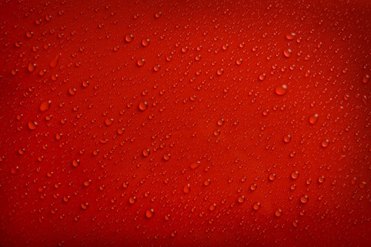 Water Drops On Red Background