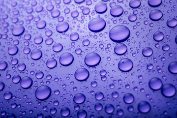 Water drops on blue background