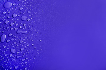 Water drops on blue background