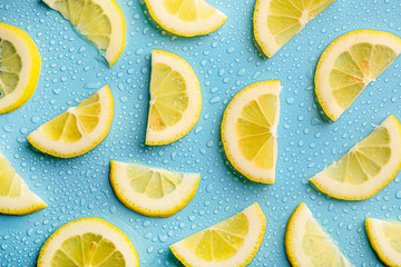Lemon slices texture on blue background