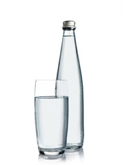 Glass water bottle and glass of water isolated on white background