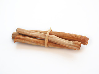 sappan wood root or sappan tree on white background is a chinese herb and suitable to invigorate blood ,remove stagnation and lowers risk of heart disease use for herb tea product or health care.