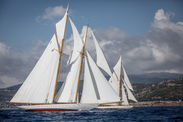 Fototapeta na wymiar Classic Boats in front of Ligurian Coast, Italy