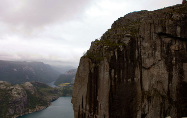 View from the Cliff Preikestolen in fjord Lysefjord - Norway - nature and travel background. Vacation concept. Granite rocks and mountains