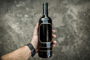 Wine of bottle and hand.Free space for your decoration. 