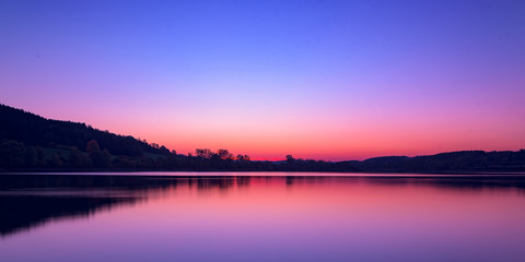 Fototapeta premium sunrise over the lake