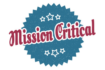 mission critical sign. mission critical round vintage retro label. mission critical