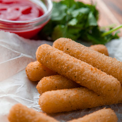 Delicious mozzarella/cheese sticks with ketchup
