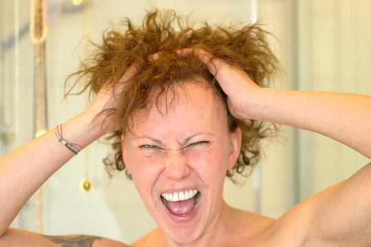 Frustrated Woman Having A Bad Hair Day