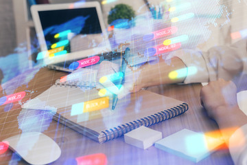 Multi exposure of woman's hands on background with technology and digital coding icons. Data development concept.