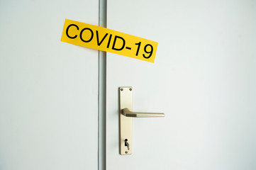 Coronavirus covid-19 quarantine, locked door, closed room, stay at home, protect health.
