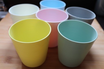 pale coloured plastic cup beakers