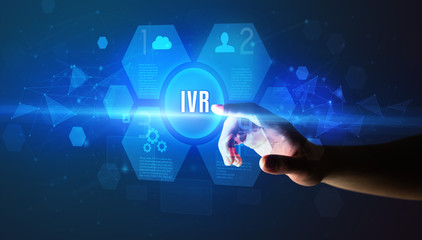 Hand touching IVR inscription, new technology concept