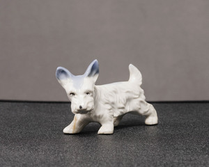 small white Scottie dog sculpture of unknown origins