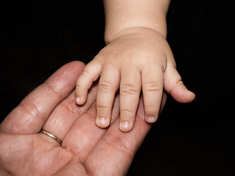 babie's and granmother's hands virus transition - Powered by Adobe