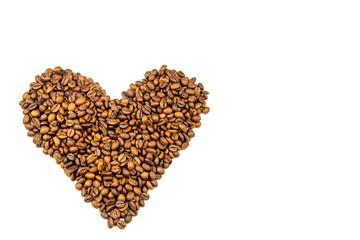 heart shape made of roasted coffee beans isolated on a white background. Top view. Flat lay