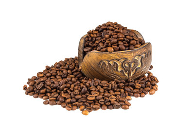 Roasted coffee beans spilling out from a wooden box isolated on a white background