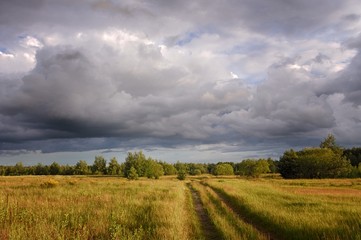 Fototapeta na wymiar cloudy clouds over the river in summer