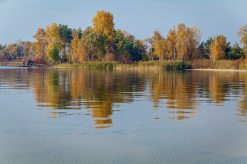 Fototapeta na wymiar A beautiful rural landscape with a big lake