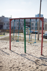 Fototapeta na wymiar Children's playground in the yard in Kiev in Ukraine