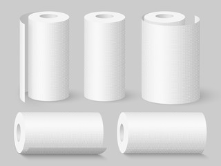 Set of realistic soft kitchen towel rolls. Isolated on grey background. Vector illustration.