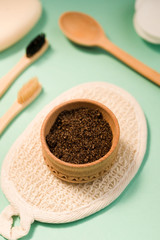 Cosmetic sours for the body, against a mint background.