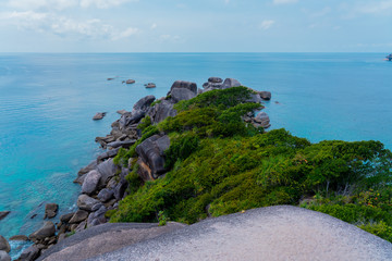 View from the top of the mountain on the sea and grey sea stones