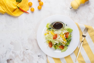 A plate of salad a table