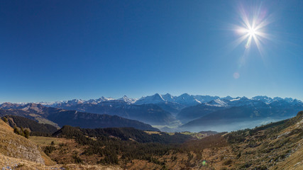 Eiger, Moench and Jungfrau mountains in panoramic view with blue sky