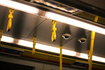 Yellow handrail in the subway in Vienna in Austria
