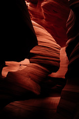 Antelope Canyon woman in rocks