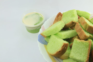 Pandan custard bread and white background.