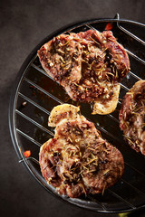 Meat with spice and herb on grill 