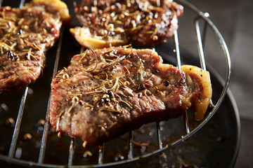 Meat with spice and herb on grill 