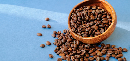 freshly roasted coffee in a wooden cup, organic products