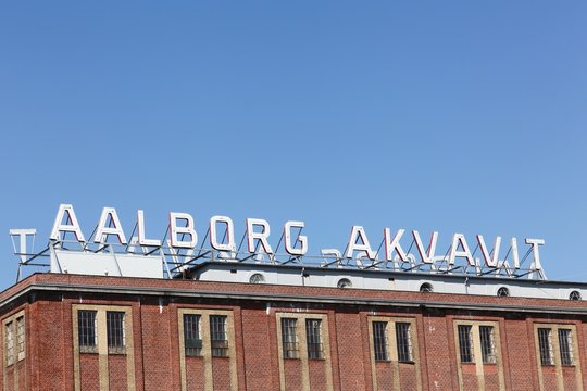 Aalborg, Denmark - May 8, 2016: Aalborg akvavit factory in Denmark. Since 1881, akvavit and schnapps has been produced in the city of Aalborg. The production moved from Aalborg to Norway in 2015