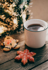 Christmas cookies. Flat lay winter cozy Christmas vintage background. The cup of tea or coffee. Christmas atmosphere.