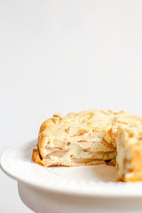 Homemade Organic Apple Pie Dessert Charlotte. Cobbler Apple Pie on White Plate.
