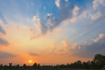 Bright orange sky and light of the sun.