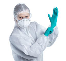 Infection Control Medical Specialist in a protective suit and respirator wearing gloves for scientific and coronavirus COVID 19 experiments and other diseases. Isolated