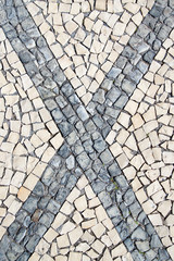 Closeup surface of blocky pattern old stone pavement