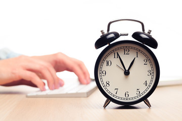  alarm clock on the background of the office  - IMAGE