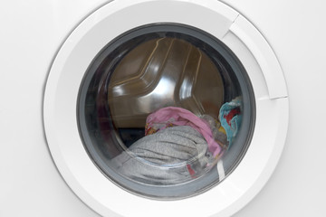 Close-up modern white washing machine