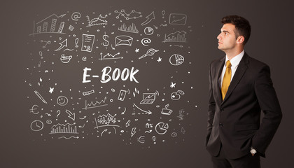 Businessman thinking with E-BOOK inscription, business education concept