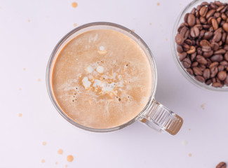 coffee with milk close-up on a white background. view from above