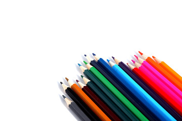 A set of colored pencils on a white background. School supplies.
