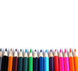 A set of colored pencils on a white background. School supplies.