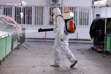 Coronavirus Quarantine. Disinfection and decontamination on a public place as a prevention against Coronavirus disease 2019, COVID-19. State of emergency over coronavirus