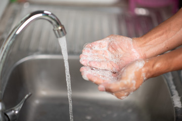 Men's hands are showing ways to wash their hands with a cleaning gel to prevent infectious diseases and prevent the virus.