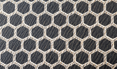 Super macro photo of non-stick frying pan surface closeup.